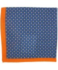 Pañuelo de bolsillo azul marino con flores y esquinas en naranja